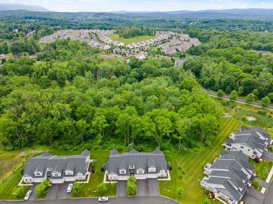 The Regency at Wappingers.  We took this angle to show the wooded privacy behind the condo (unit for sale was in building second from left).