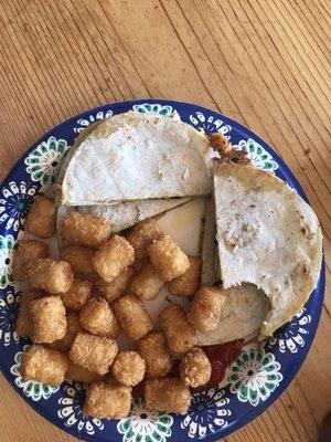 Quesadillas are filled with chicken, cheese and peppers!