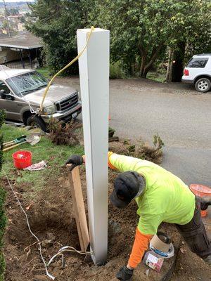 Eugene C. Installing post.