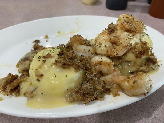 Crab cake benedict plus crab plus shrimp.