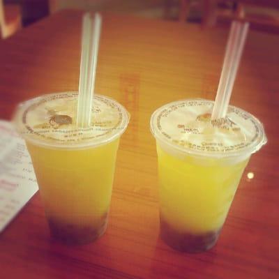 A Mango and a passion fruit boba flavored teas. Regular size.