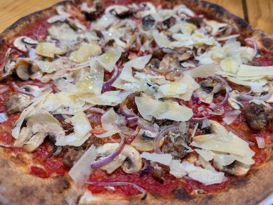 Boscaiola Pizza (sweet sausage, mushrooms, red onions and shaved parm)