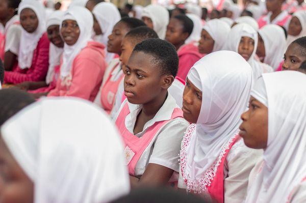 Young ladies listening to the importance on breast cancer education