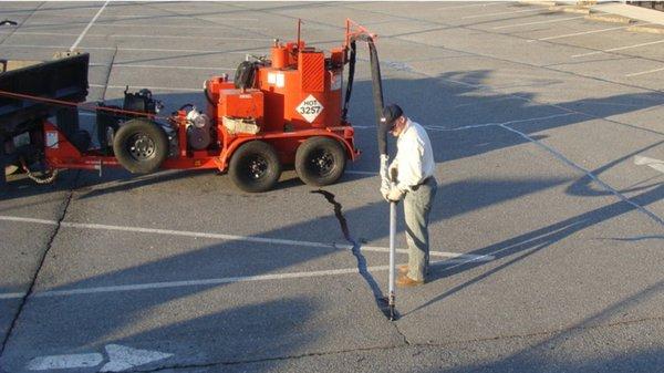 Asphalt Crack Repair by Texas Blacktop Service.