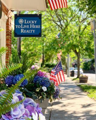 Lucky To Live Here Realty, Sign on Main Street