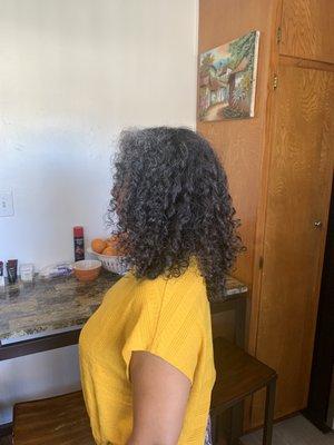 Curly layered cut by Lizette