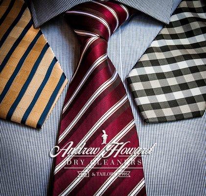 Mens ties are delicately cleaned and hand pressed