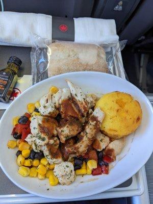 Chicken teriyaki with veggies, cornbread, and a roll