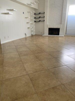 Living room after cleaning, grout repair and sealing.