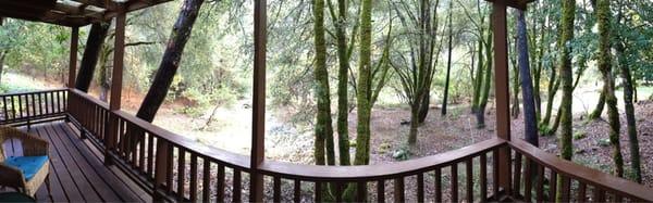 Deck facing the river and the forest