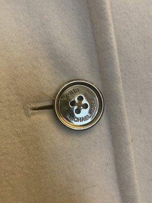 Button thread coming apart.