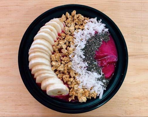 Dragonfruit Bowl with Banana, granola, coconut, and chia seeds