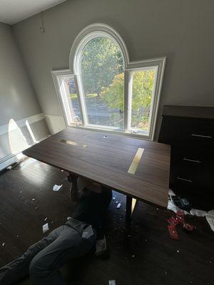 Desk assembly and heavy lifting