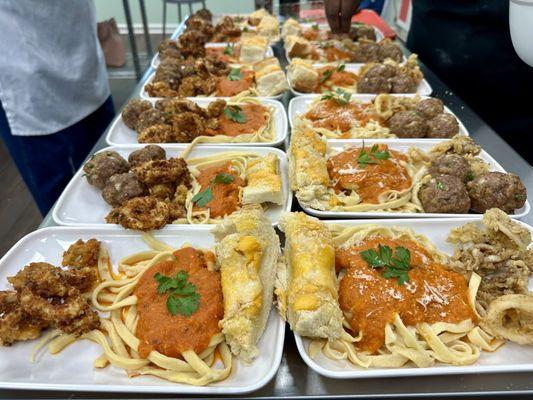 Calamari with homemade pasta, sauce & Italian meatballs.  Italian Night