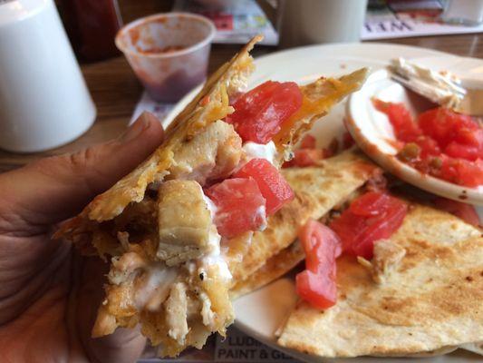 My quesadilla had chunks chicken. NOTE:  tomatoes requested by me, it. It comes without.