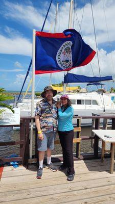 Bold colors of the Belizean flag greet visitors to the tiny Caribbean nation of Belize