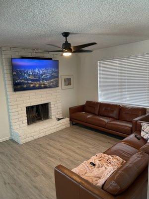 TV mount on brick fireplace