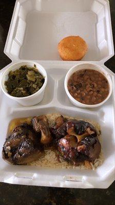 Oxtails with blackeyed peas and greens