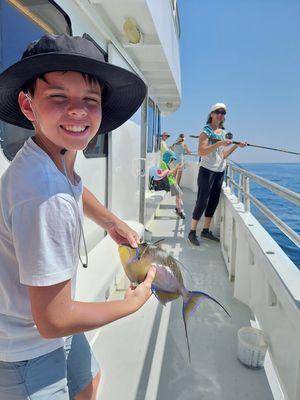 The smile says it all! Fishing is a blast!