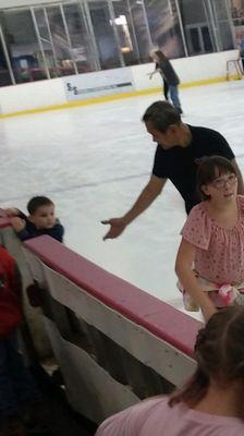 This is the event host & skating instructor helping our youngest skater get started