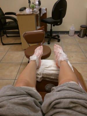 Pedicure with paraffin wax.