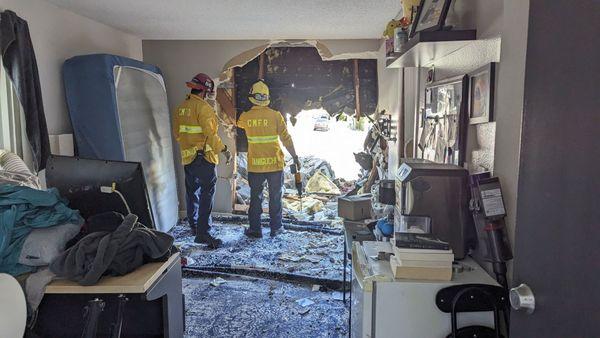 They boarded the wall after demolishing it further. It was a GWagon that plowed our home.