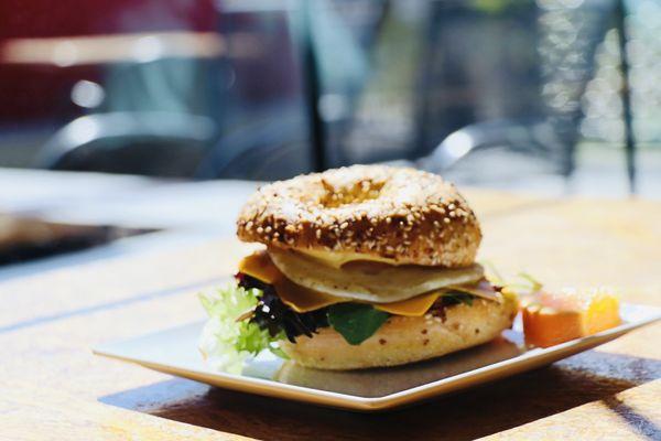 Sharp cheddar , fried egg, greens with their take on a classic French vinaigrette! Perfect pairing!