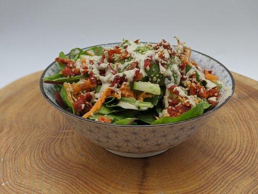 Green Goddess Salad (Mixed Greens, Avocado, Sundried Tomato, Cucumber, Carrots, Hemp Seeds, and Housemade Goddess Dressing)