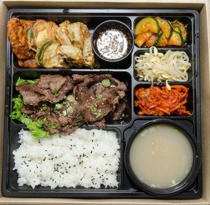 Kalbi (Boneless Short Rib Cubes) Lunch Special. Includes kimchi jeon, zucchini jeon, and Korean meat and tofu pancake