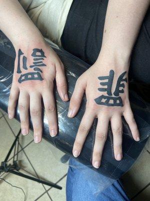 Kanji Hand Tattoo done by Ricky