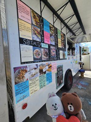 Picture menu on the side of the Food Truck