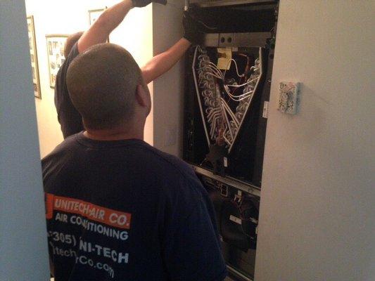 Air conditioning installation professionals.