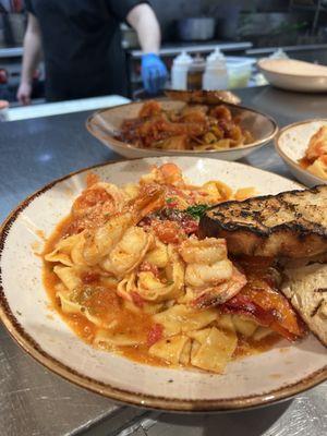 Angry prawn pasta, wild gulf prawns, mama lil peppers, crushed tomatoes, garlic, white wine butter broth