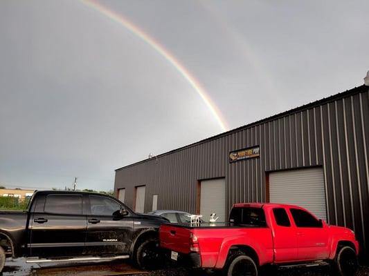 Outside of our shop right after some of this crazy summer rain fell in Helotes, TX