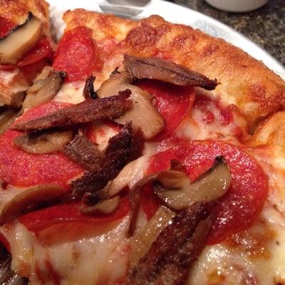 Mushroom, pepperoni, anchovy with garlic butter crust edges.