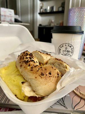 Garlic breakfast bagel + a side of Yellow Cup