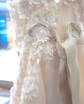 OrganiCare wedding gown with decorative flowers. One of the more challenging gowns to clean.