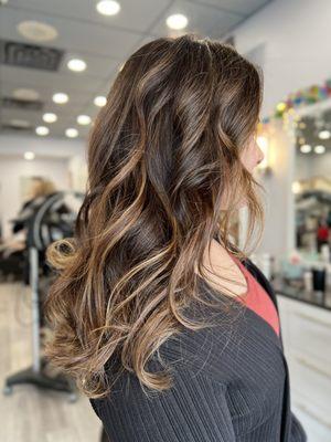 A small amount of brightness on the ends really helps add more texture and movement through your hair.