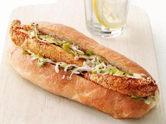 Fully Loaded Fish Sandwich made with homemade coleslaw and melted cheese on a toasted hoagie.