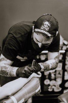 Marc Redd tattooing