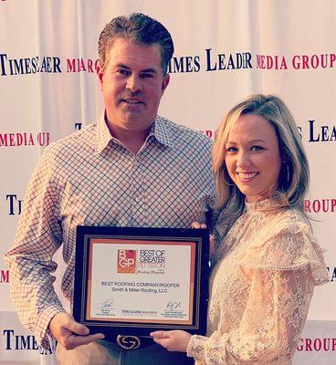 Jason & Laura accepting the Best Roofer Award!