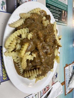 Open face beef sandwich with fries and beef gravy