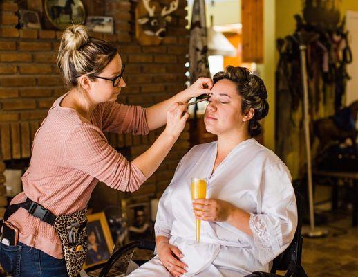 Me doing makeup on one of my brides!