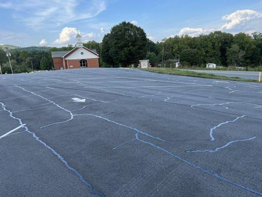 Crack sealing on parking lot