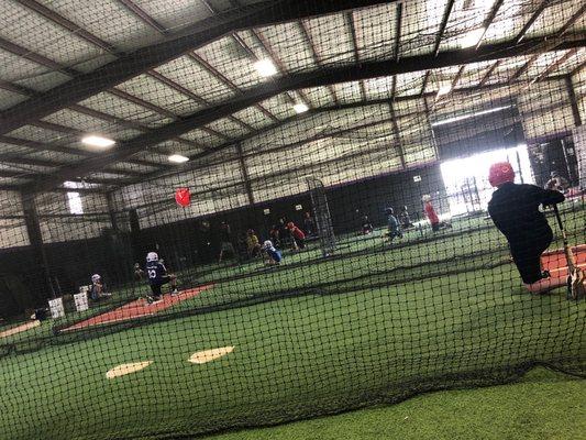 Sunday evening baseball camp with stations for everyone.