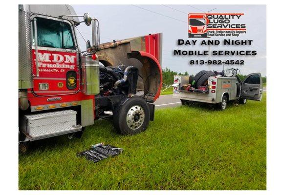 piterbilt semi truck repair on the roadside