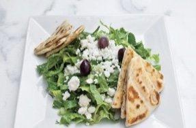 Green Salad romaine lettuce, scallions, dill, black olive, feta cheese, and lemon dressing. Served with pita.