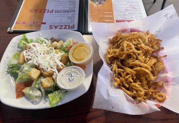 Rings and a salad with creamy parm.