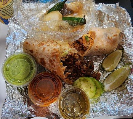 Half of an extreme burrito ($15.50 Mar '24)