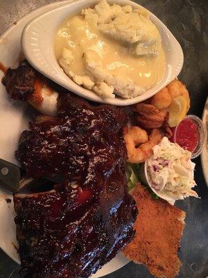 BBQ ribs with shrimp (good sized shrimp!), mashed potatoes and gravy, coleslaw, and cheese bread.